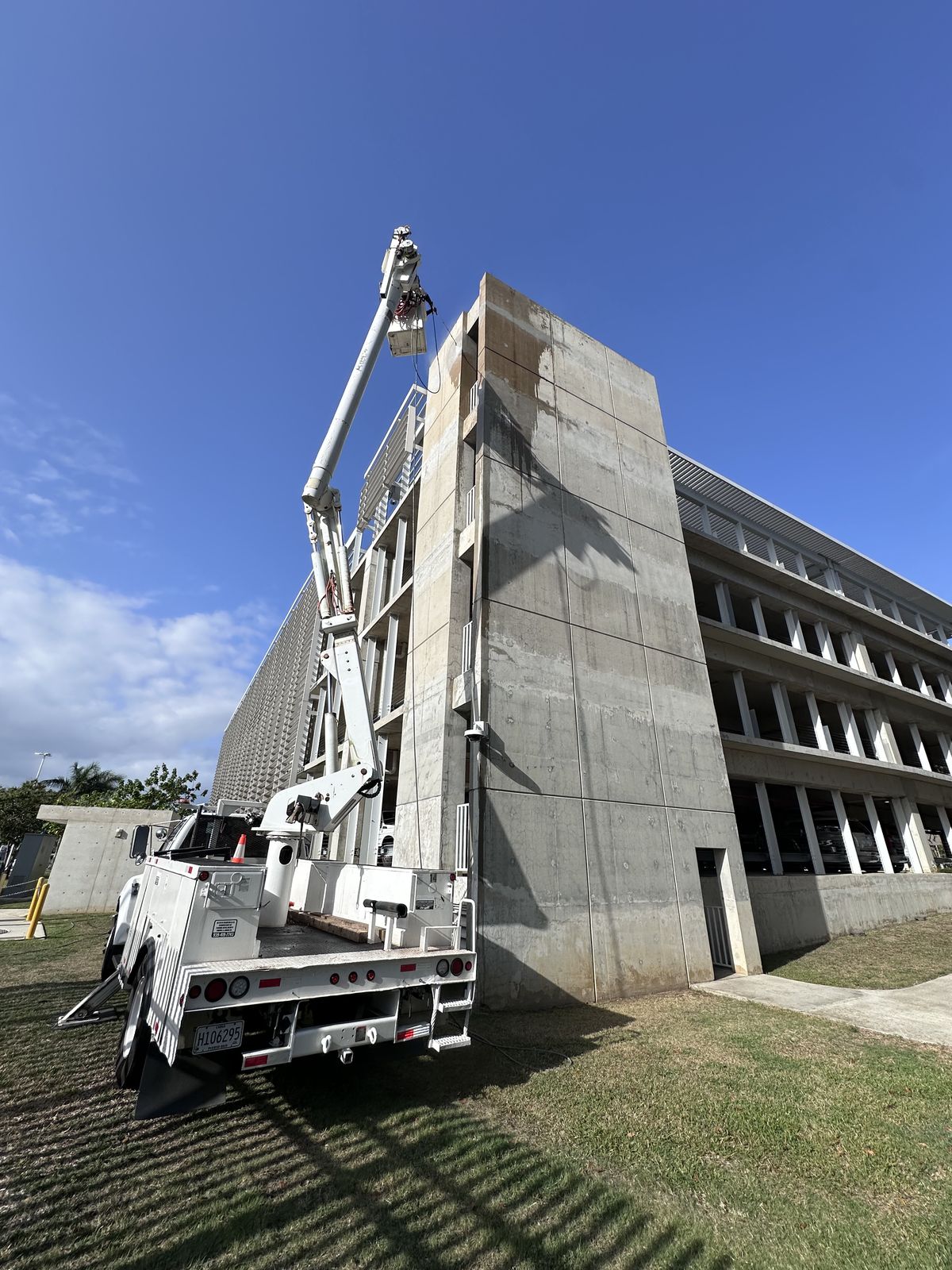 KLJ bucket truck working on a building facade